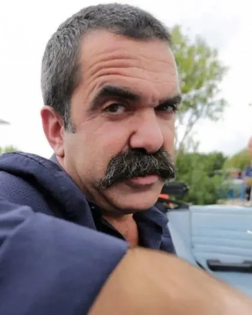 Alparslan Özmol Kimdir